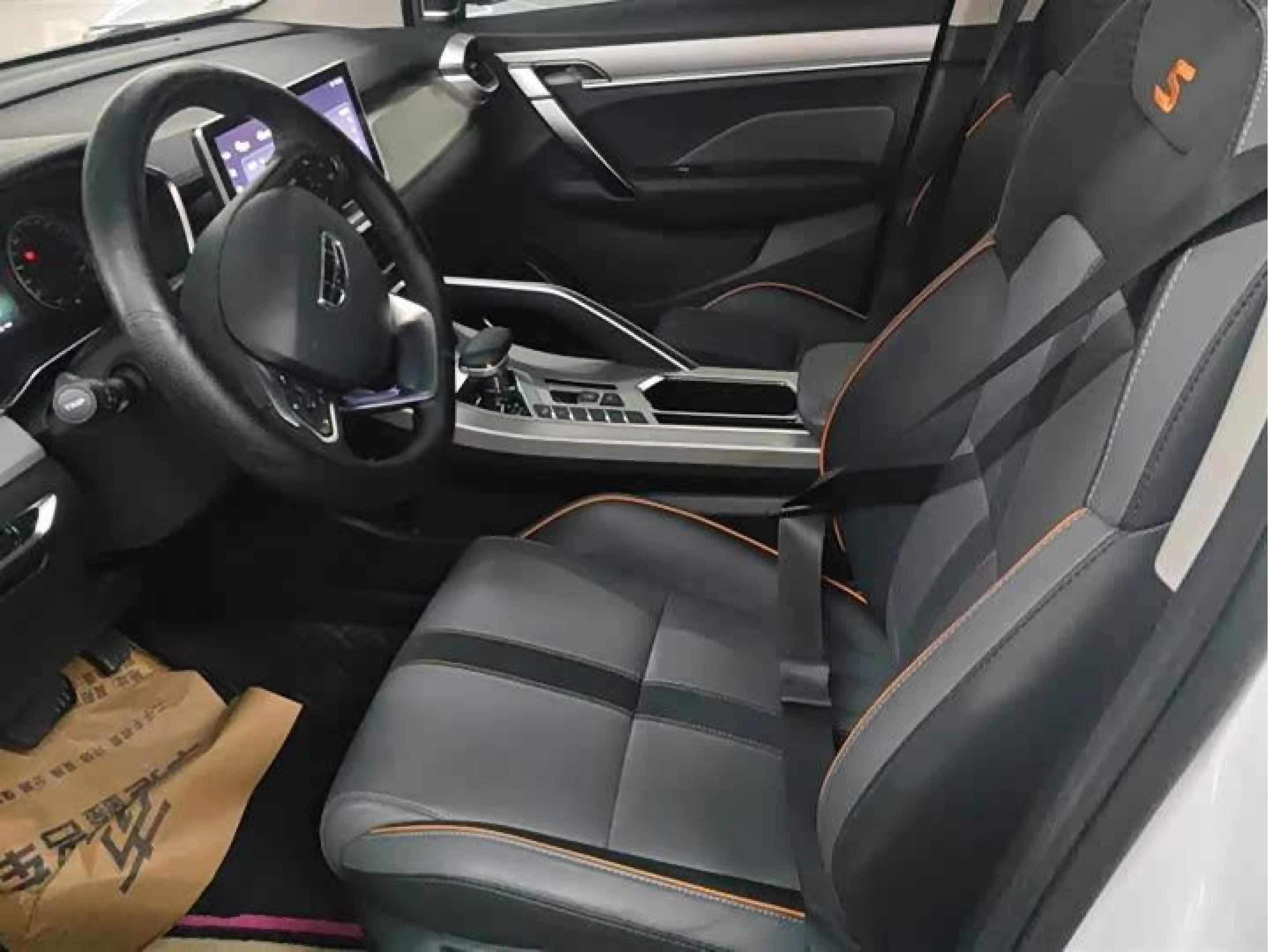 White 2023 Geely Coolray front three-quarter view, representative market version